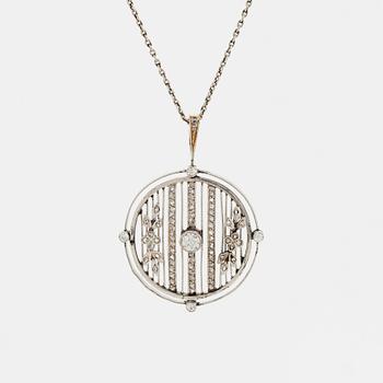 488. A platinum and 14K gold pendant set with old- and rose-cut diamonds.