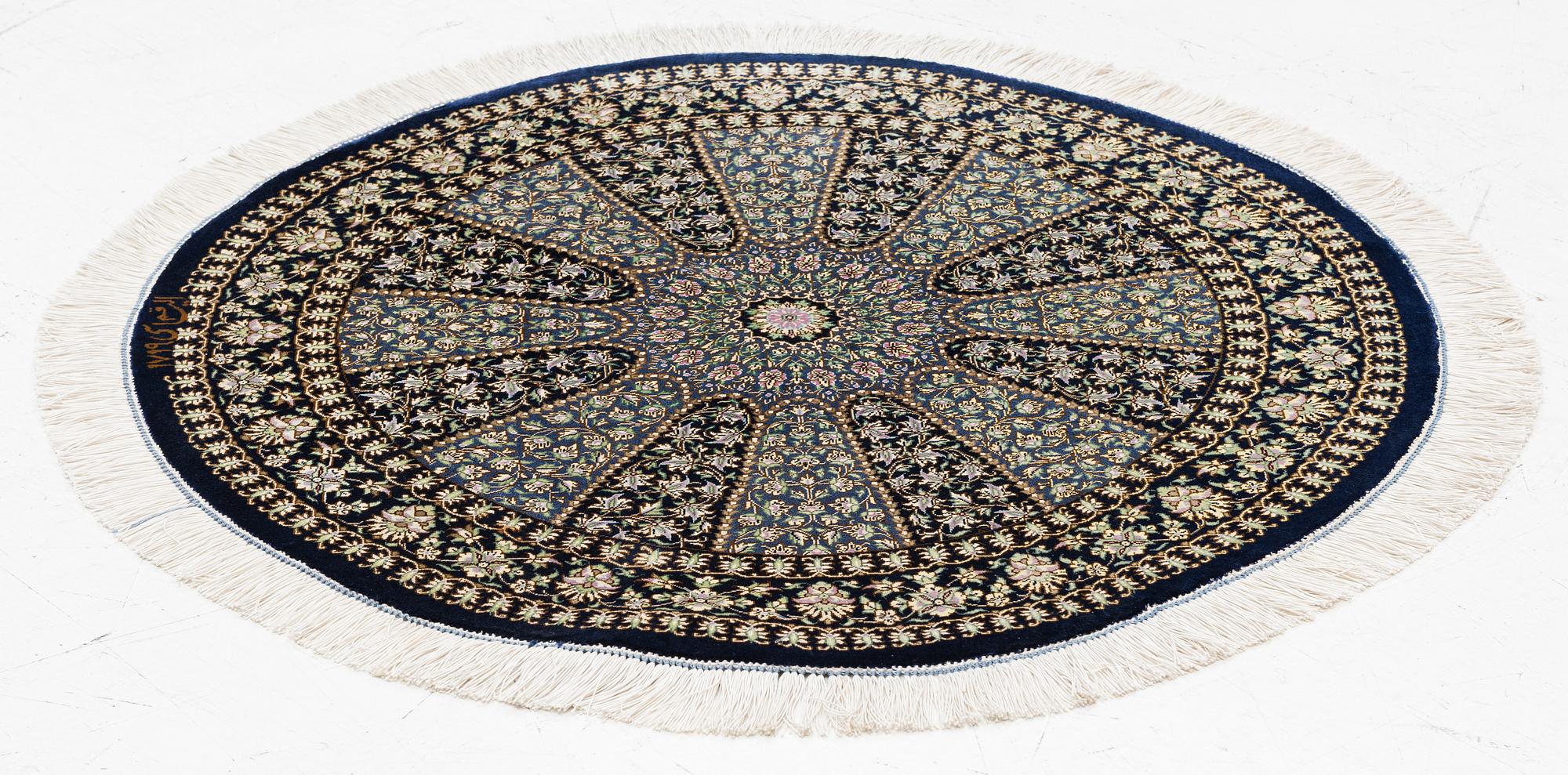 Rug, Ghom, signed, diameter 80 cm.