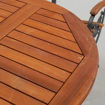 A garden table and four garden chairs from Covent Garden, 21th century.