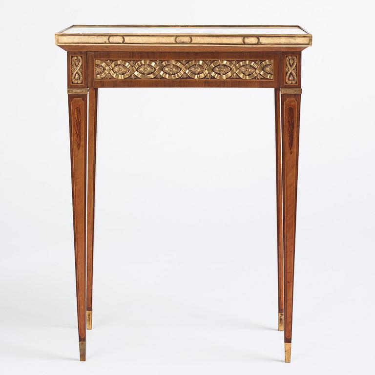 A Gustavian marquetry, ormolu-mounted, and marble table by G. Iwersson (master in Stockholm 1778-1813), signed 1781.