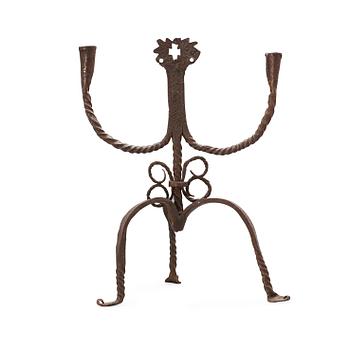 523. A Swedish 18th century wrought-iron two-light candlestick.