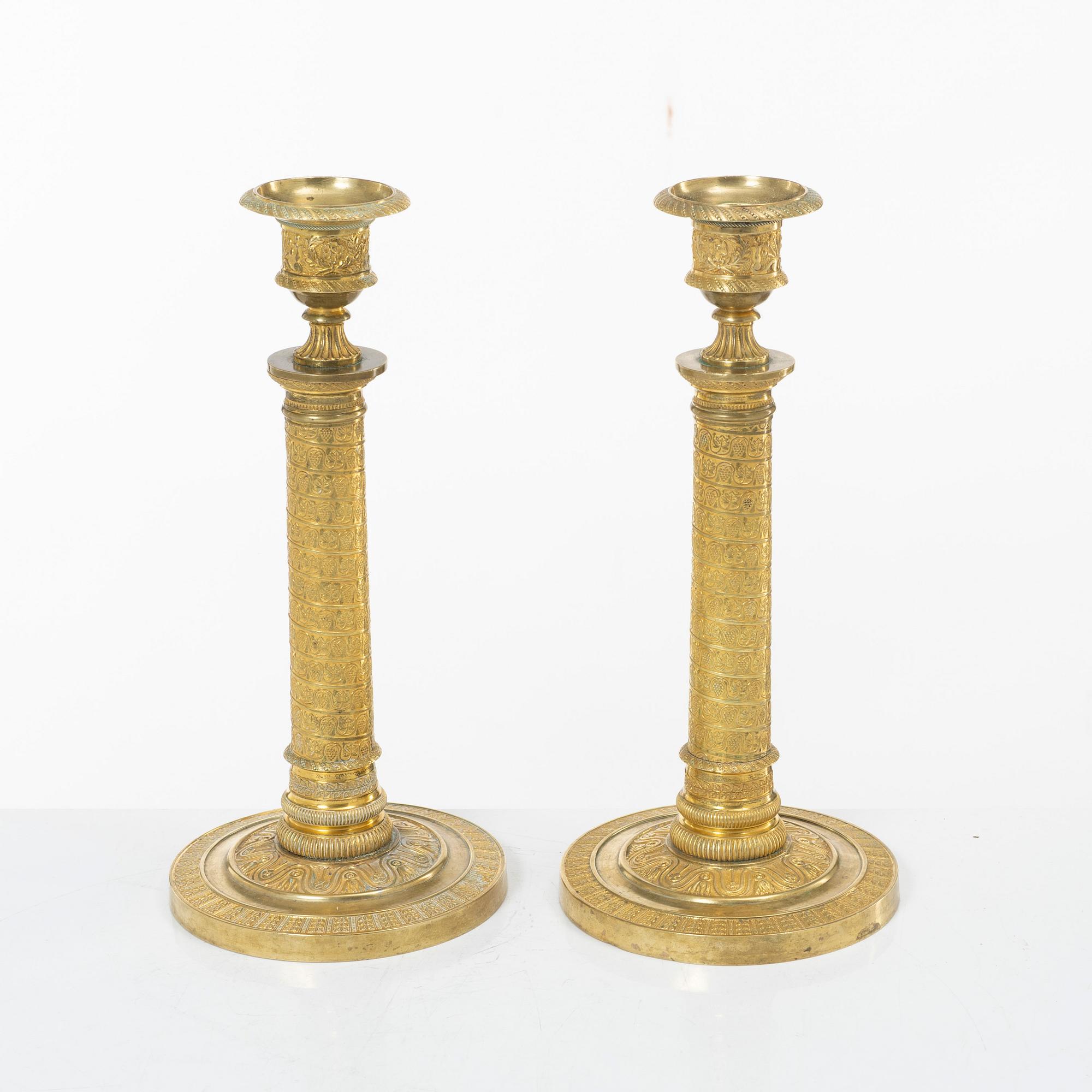 A pair of Empire candlesticks, France, early 19th Century.