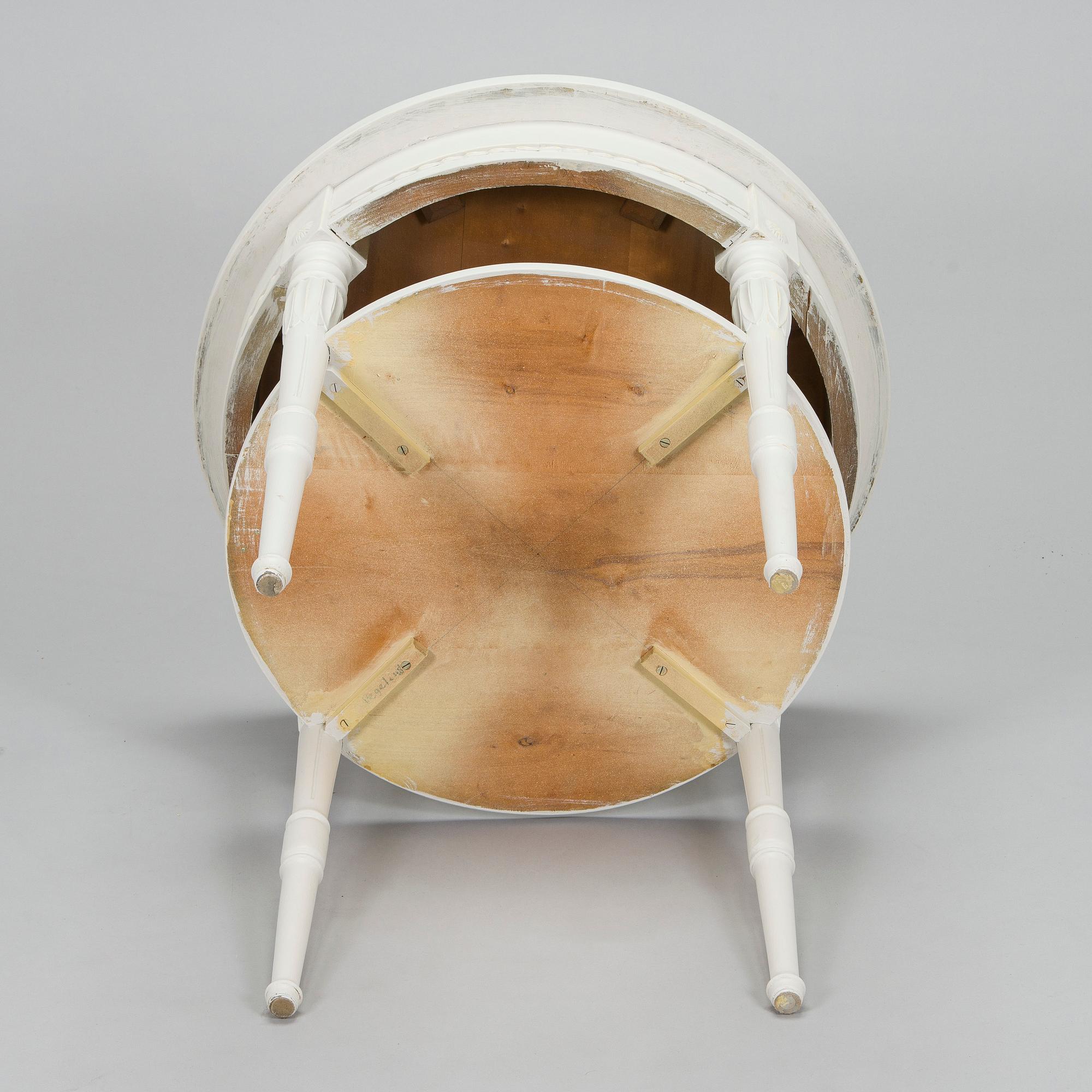 A Gustavian style small round table from first half of the 20th century.
