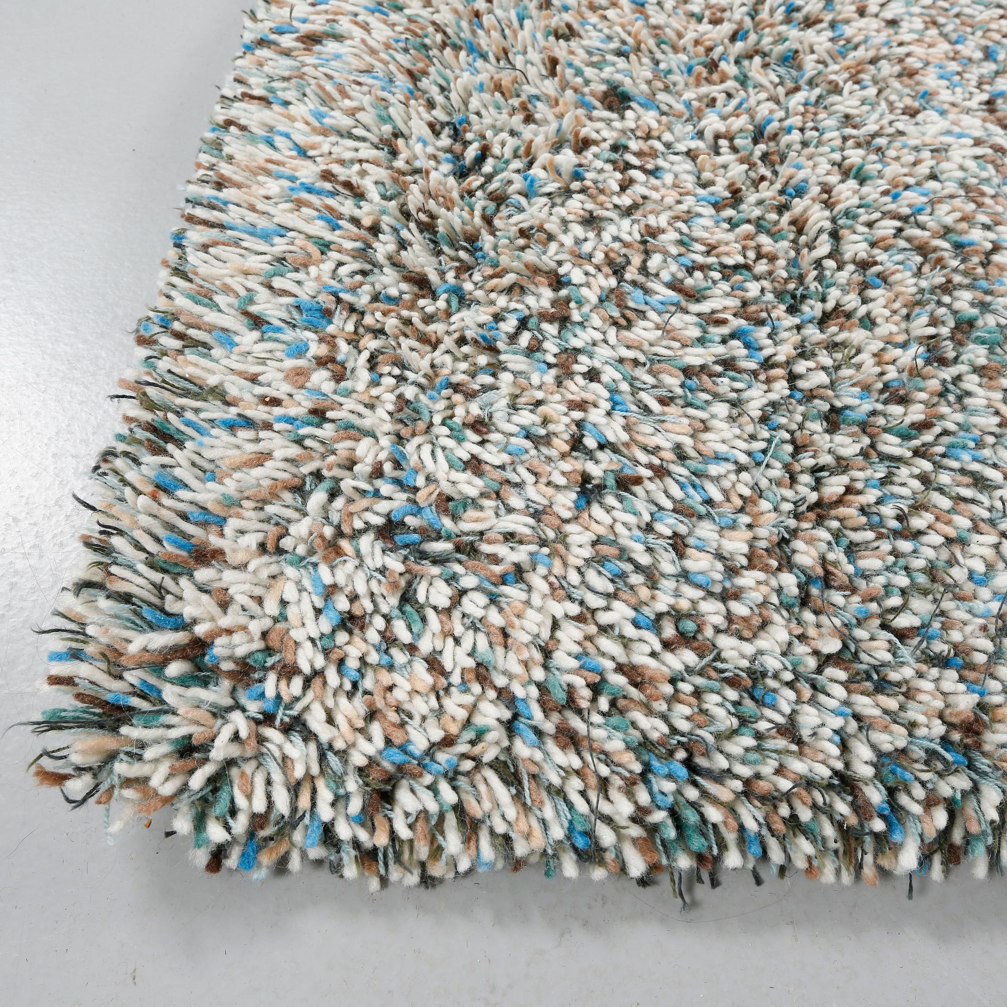 A rug by Gunilla Lagerhem Ullberg, Kasthall, 302 x 123 cm.