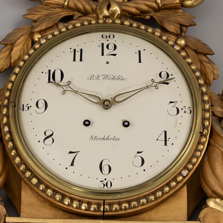 Wall clock, Gustavian style, P.N. Wohlin, Stockholm, 20th century.