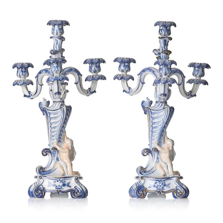 A pair of Royal Copenhagen 'Blå blomst' four-light candelabras, Denmark, 1900-tal.