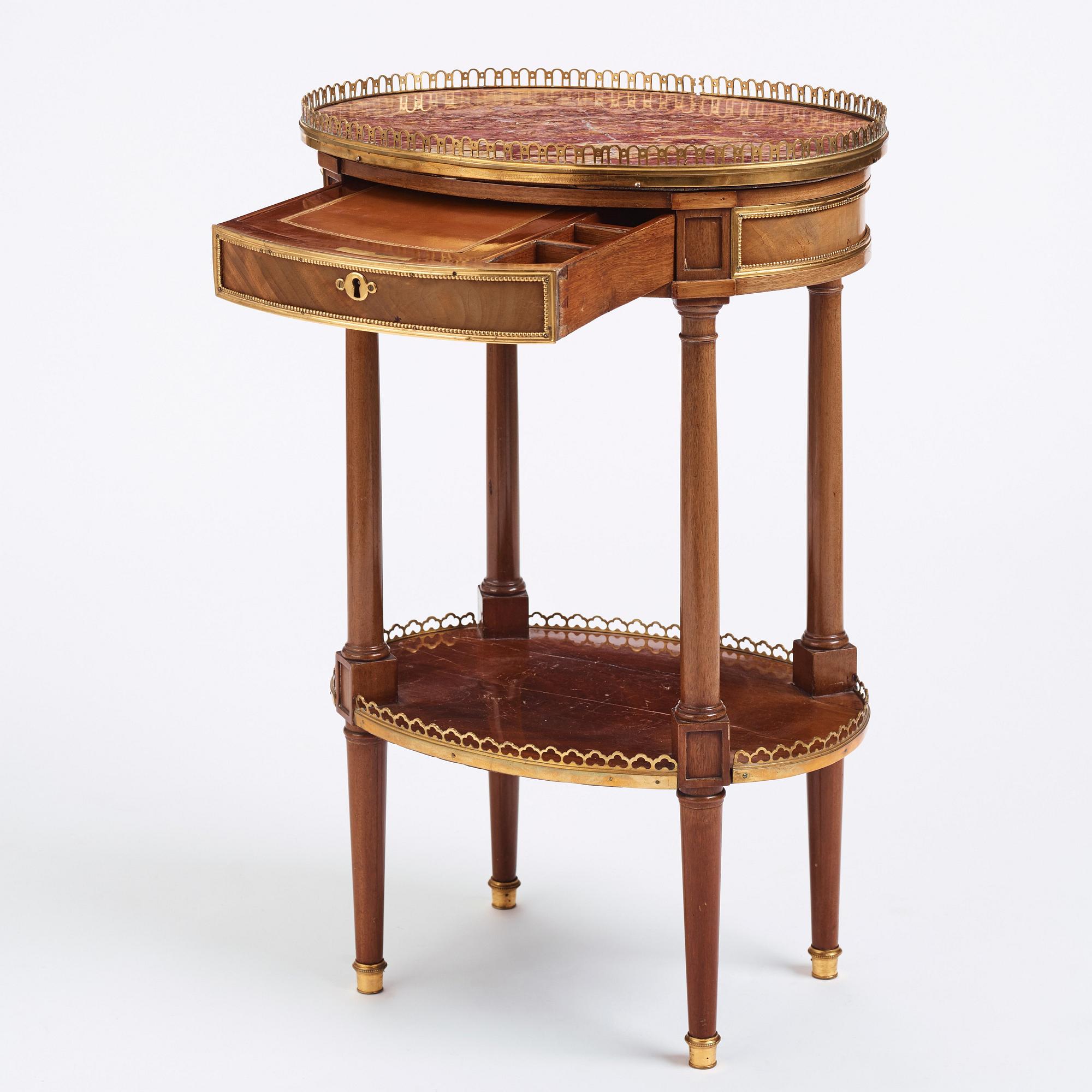 A Louis XVI mahogany and ormolu-mounted table signed Roger Vandercruse Lacroix 'RVLC' (master in Paris 1755-1799).