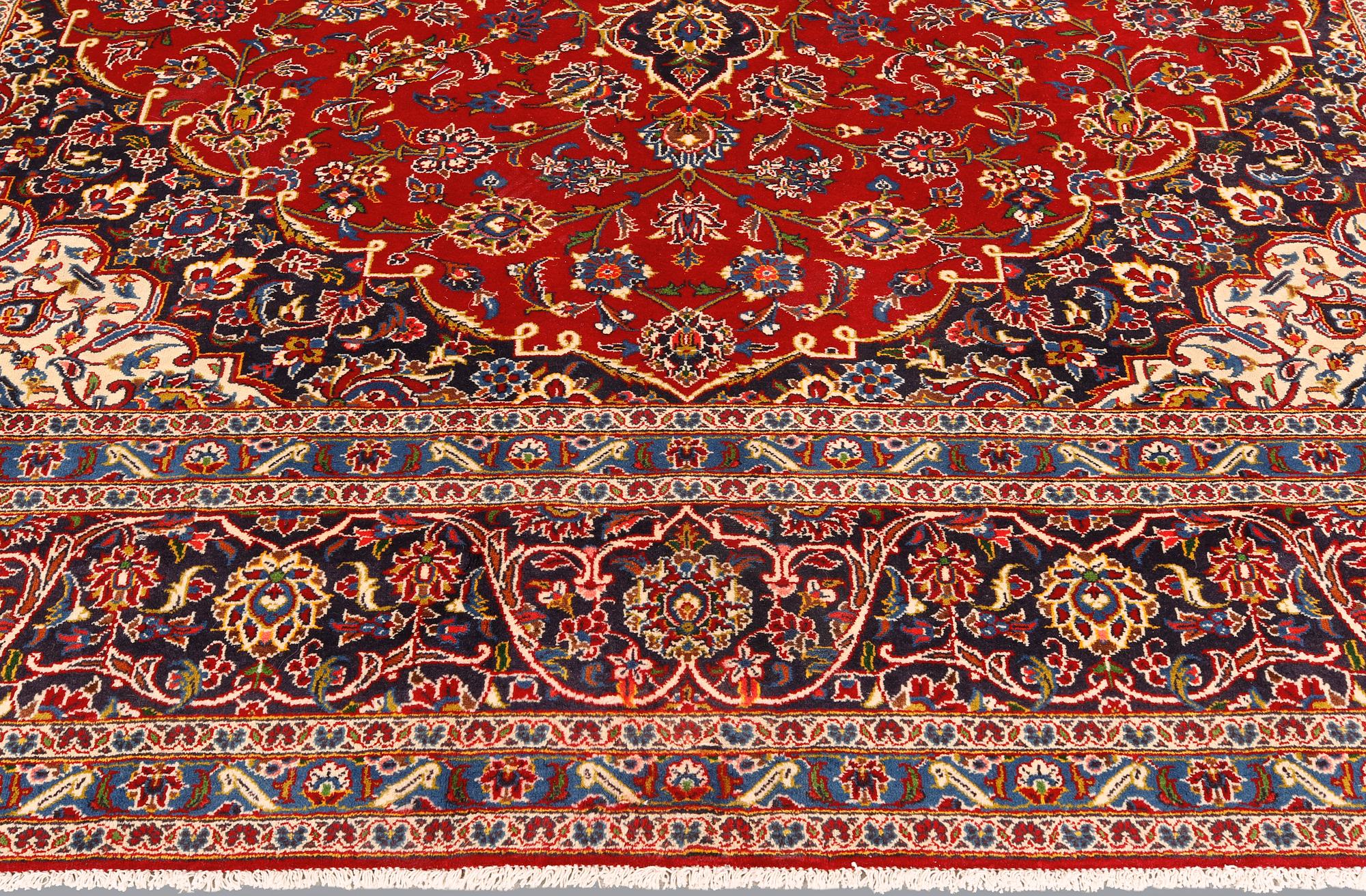 A Keshan carpet, 398 x 298 cm.