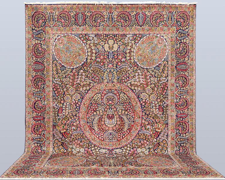 A carpet, Kirman Laver, 'Millefleur', c. 393 x 300 cm.