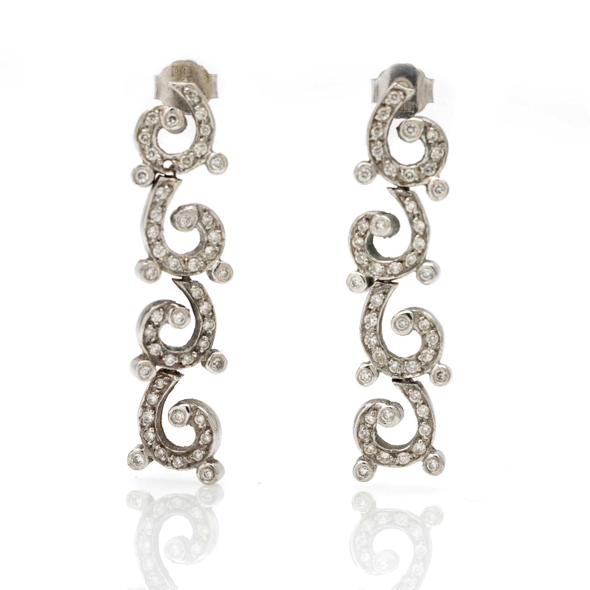 Earrings, a pair, white gold and brilliant-cut diamonds.