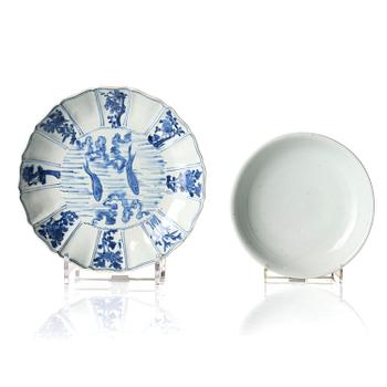 1307. A blue and white and a white glazed dish, Ming dynasty (1368-1644).