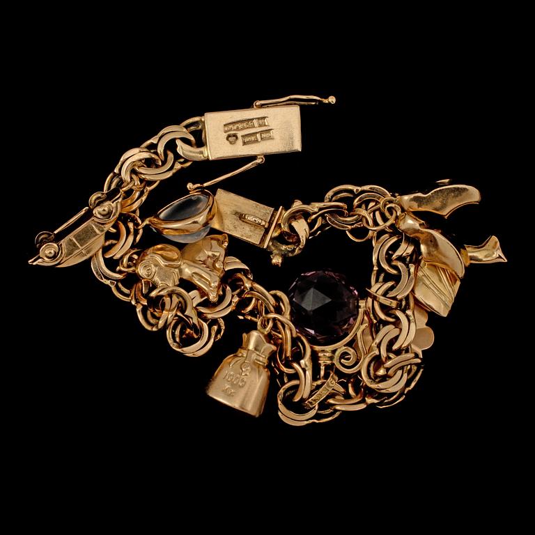 BERLOCKARMBAND, 18k guld med månsten och ametist, Gustav Dahlgren & Co, Malmö, 1963. Vikt 22 g.