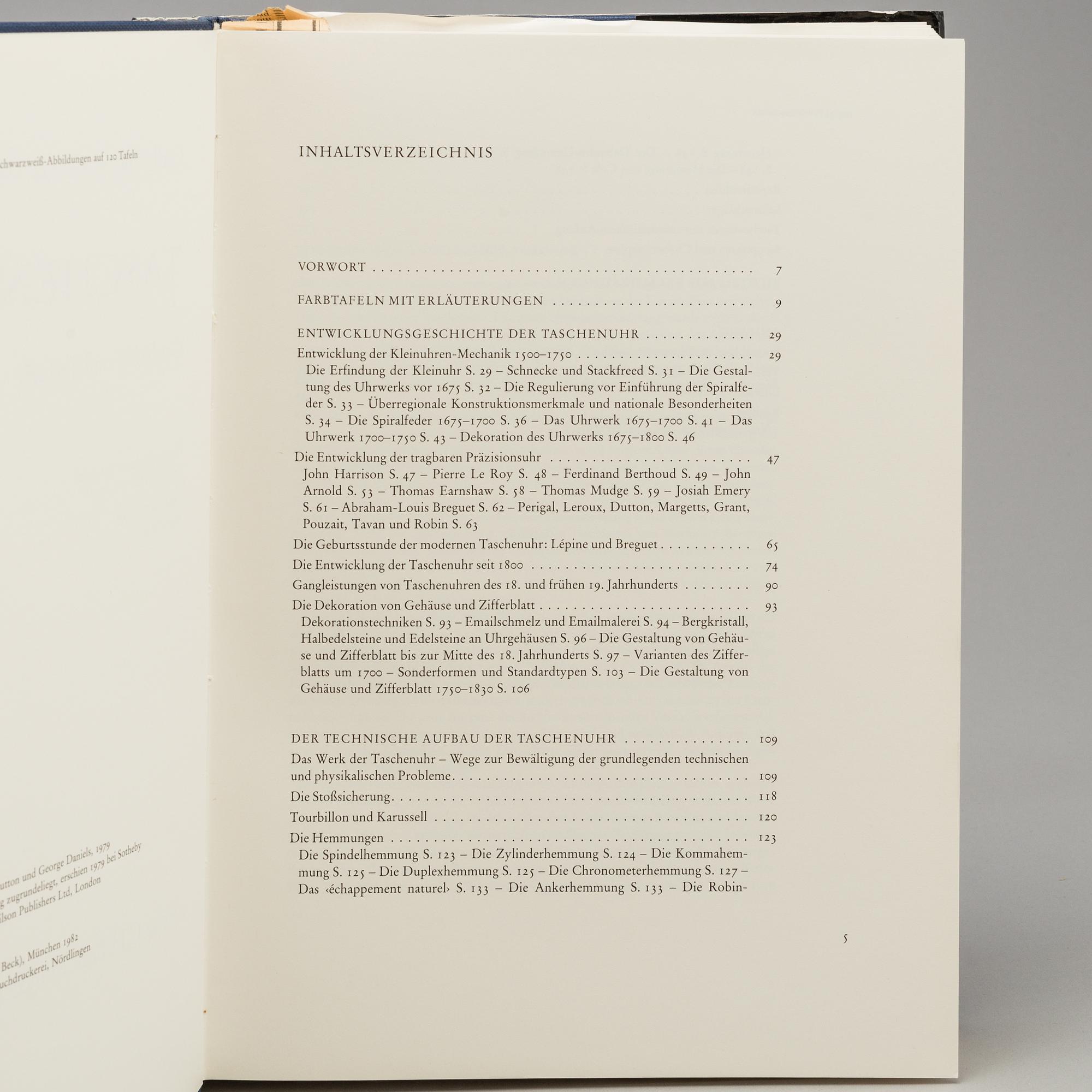 A set of 5 watch books.