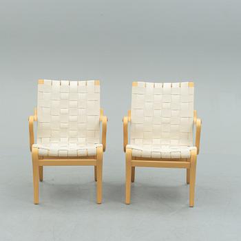 A pair of second half of the 20th century 'Mina' armchairs by Bruno Mathsson.
