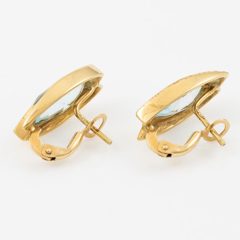 Earrings, 18K gold set with navette-cut blue topazes.