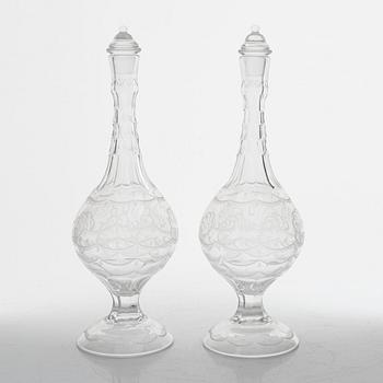 Edward Hald, a pair of "Molnet" decanters with stoppers, Orrefors, Sweden.