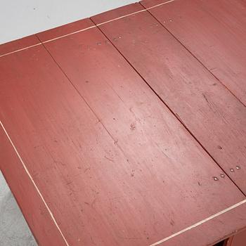 A gate leg table, 19th century.