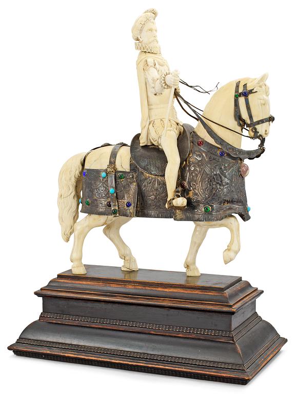 A late 19th century equestrian ivory, wood and metal statue.