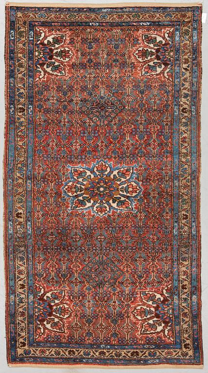 A RUG, semi-antique Hamadan, ca 200 x 117 cm.