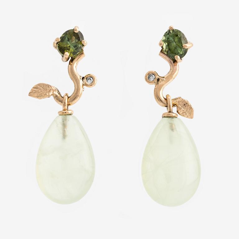 Earrings with prehnite, green tourmalines, and octagon-cut diamonds.