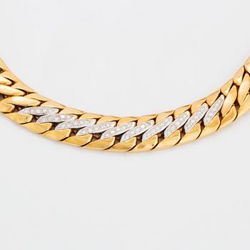 A Bucherer necklace in 18K gold set with round brilliant-cut diamonds.