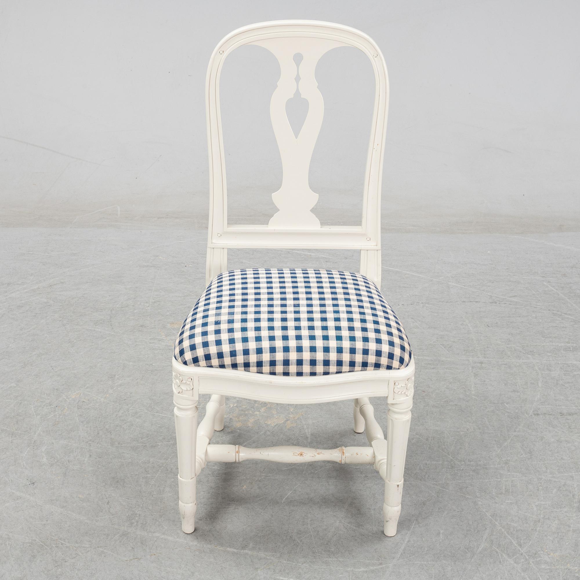 Eight Gustavian style 'Hallunda' chairs from IKEA.