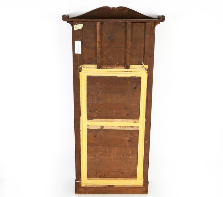 A 19th Century mahogany mirror with a console table.