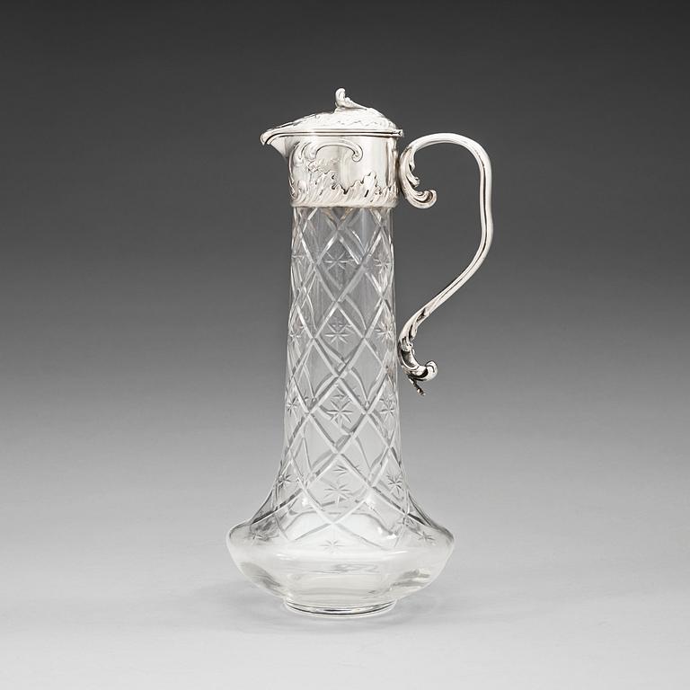A Swedish 20th century parcel-gilt and cut glass decanter, marks of W.A. Bolin, Stockholm possibly 1918.