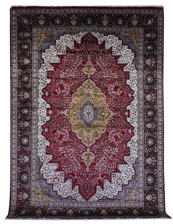 A carpet, Oriental Silk, ca 337 x 241 cm.