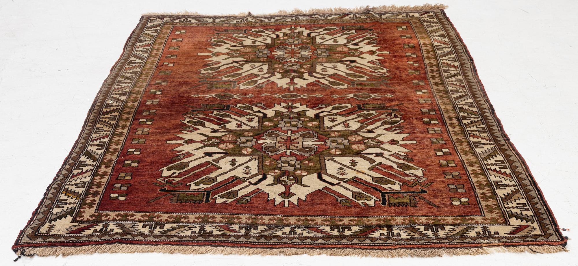 A Chelaberd rug of , 'Eagle Kazak' design, South Caucasus, c.  234 x 164 cm.