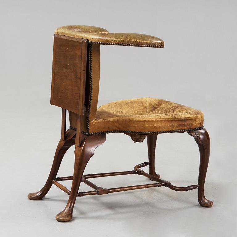 An English 18th century reading and writing chair.