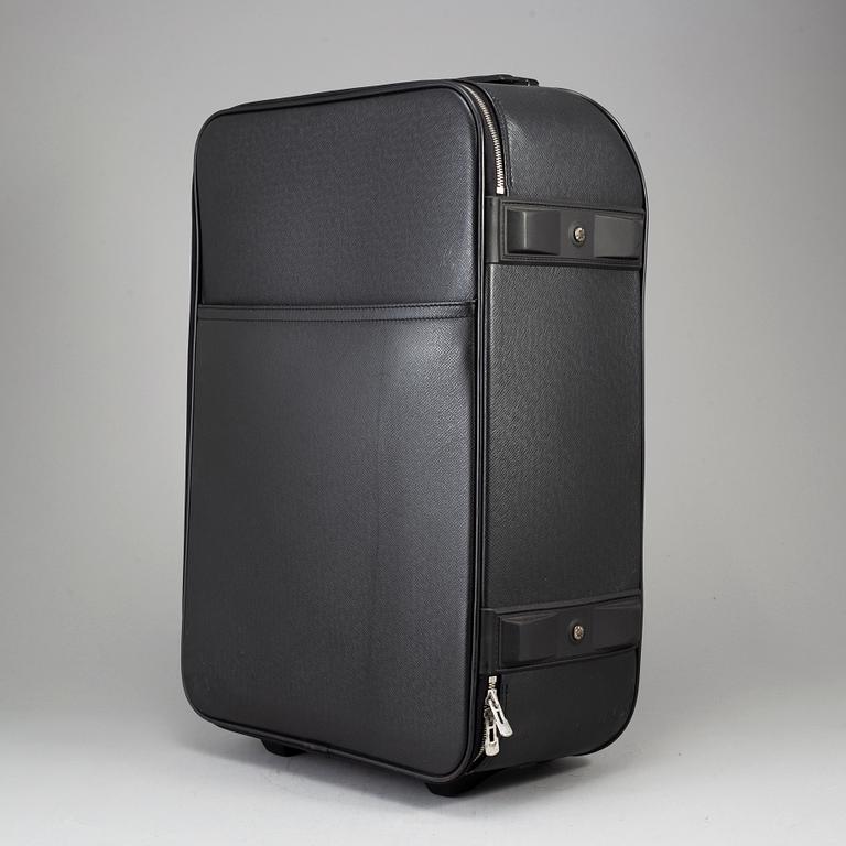 A black ardosie Leather Pégase 55 Suitcase.