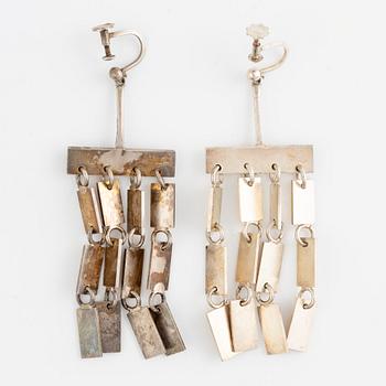 Lars Arby, a neck ring, two pendants and two pairs of earrings, silver, Gothenburg circa 1966, 1976, 1977 and 1980.