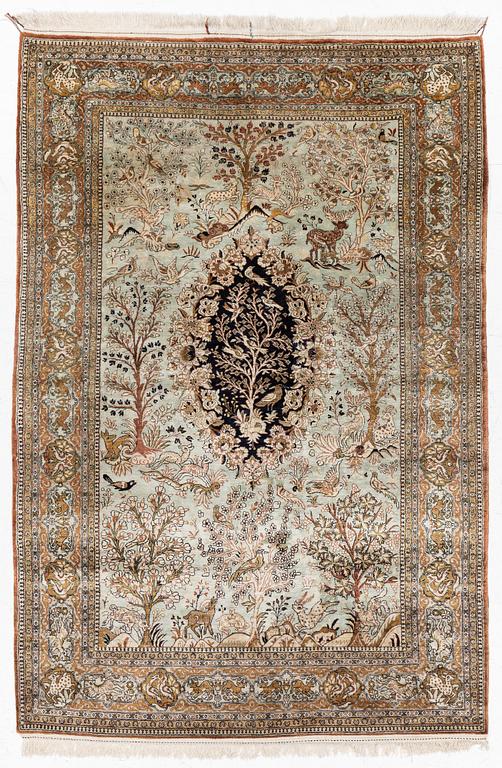 A Ghom, figural, silk rug, c. 205 x 140 cm.