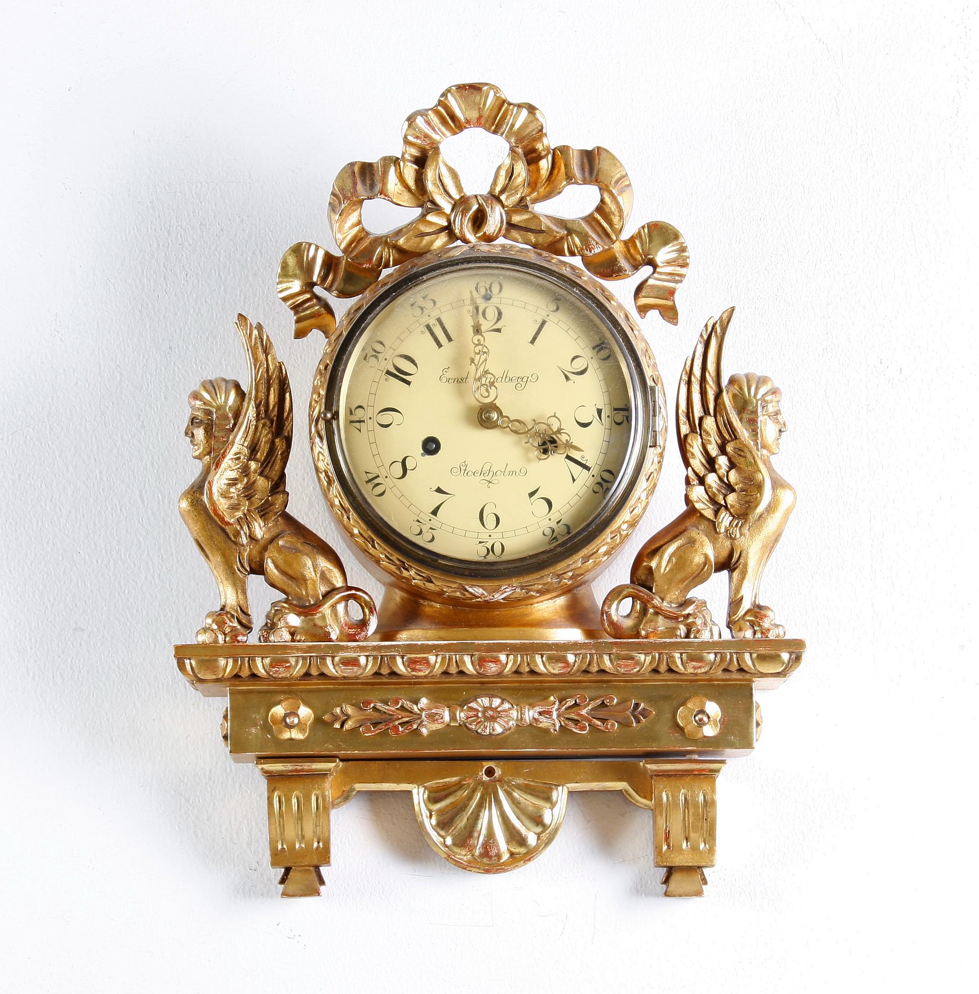 VÄGGPENDYL, empirestil, Ernst Lindberg, Stockholm.