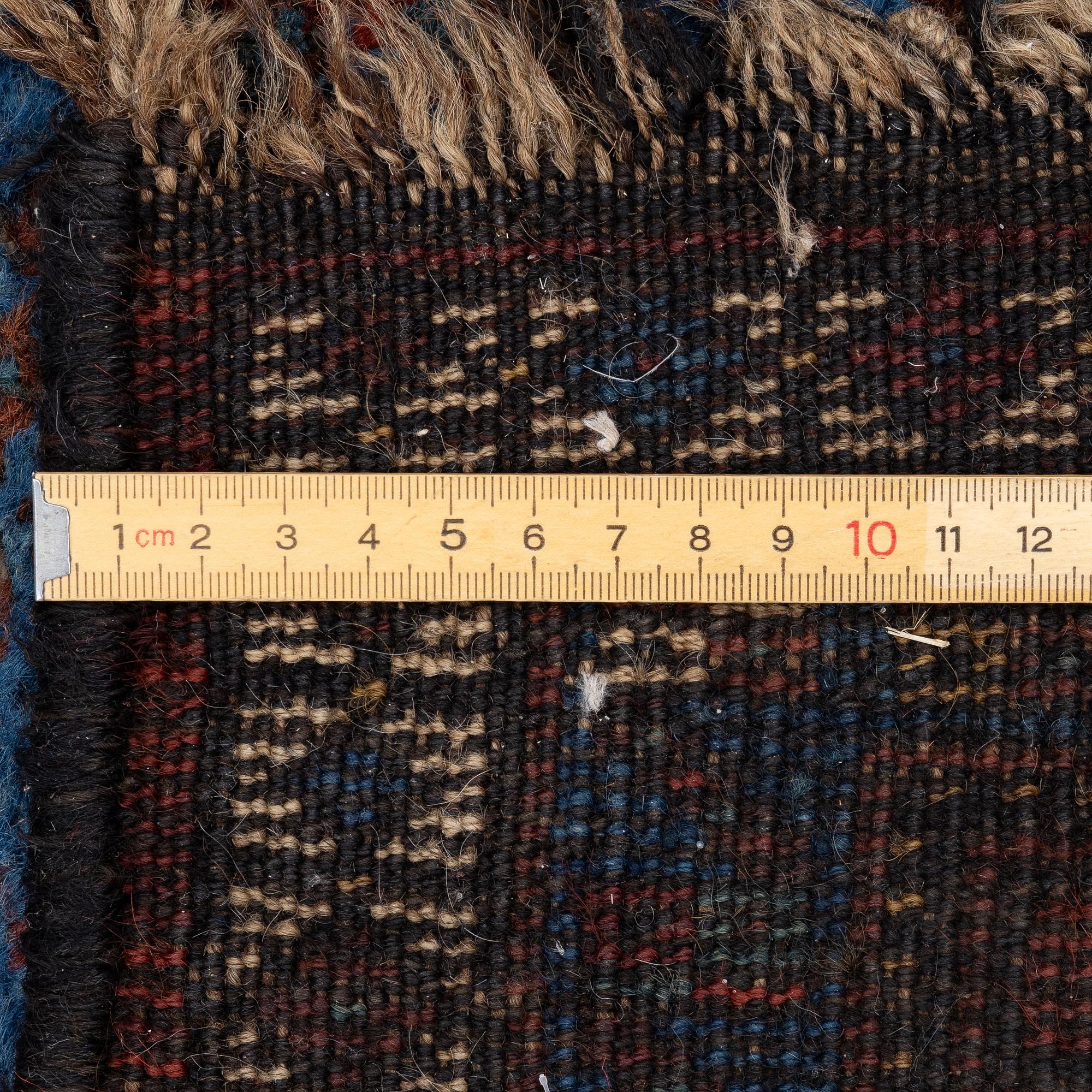 A Khamseh rug, antique, c. 192 x 155 cm.
