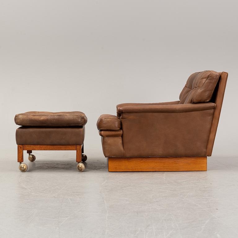 A 'Saturn' easy chair with stool 'Merkur' by Arne Norell, 1970's.