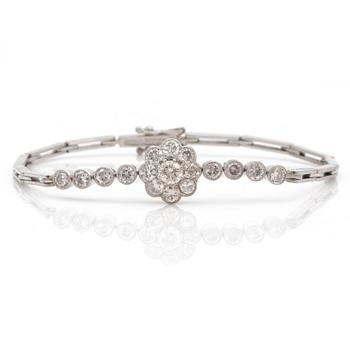 A bracelet set with round, brilliant-cut diamonds.