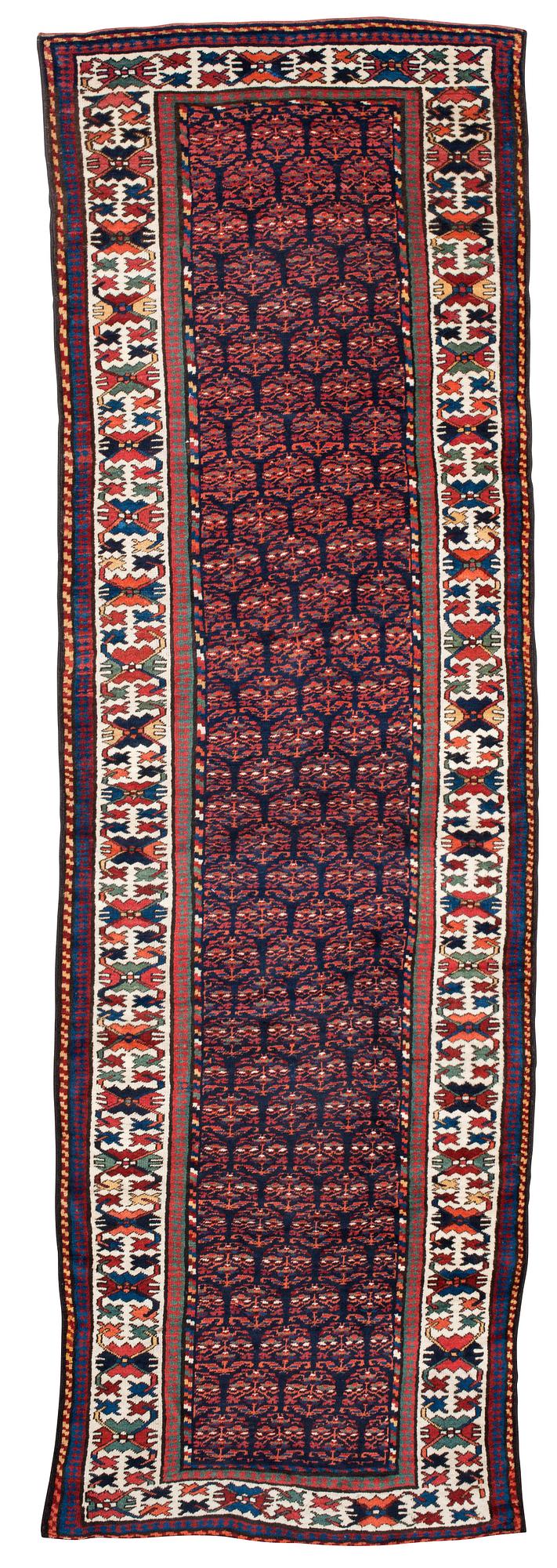 SEMI-ANTIQUE KURDISH RUNNER, probably. 326 x 102 cm.