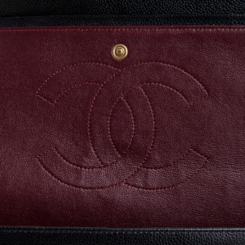 Chanel, a 'Double Flap Bag Maxi' bag, 2013-2014.
