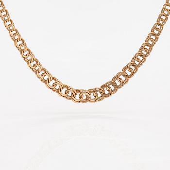 A 14K gold necklace.