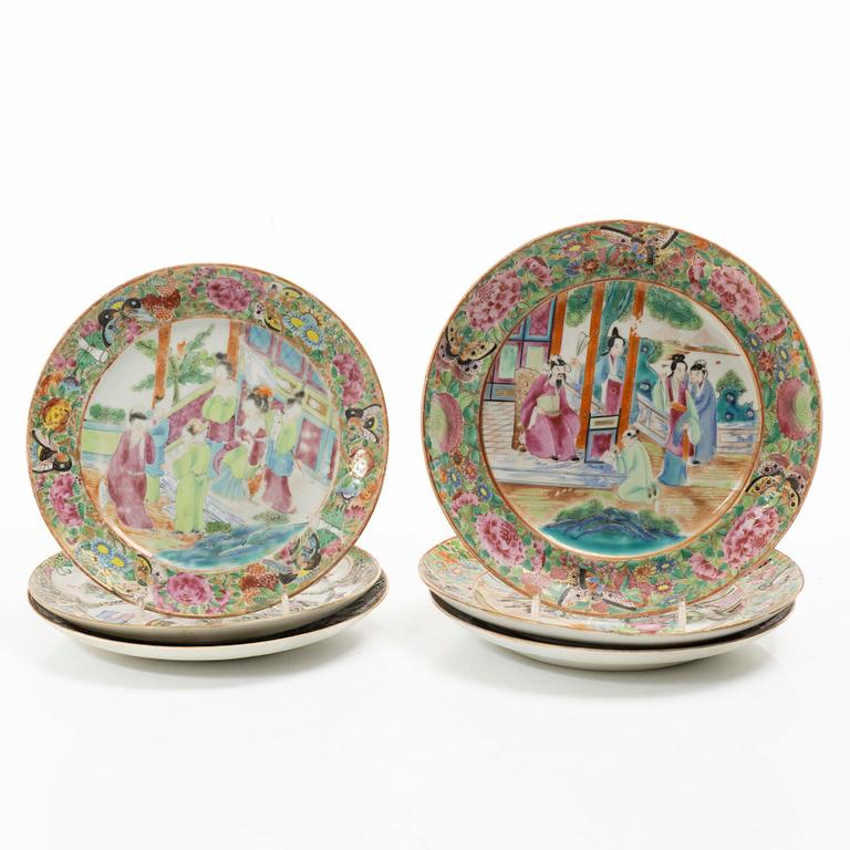 A matched set of 14 famille rose 'Canton' dinner plates, Qing dynasty, 19th century.