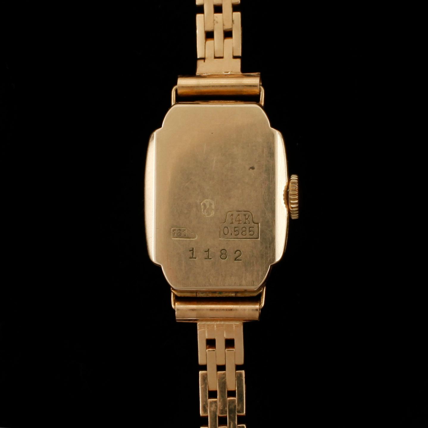 ARMBANDSUR, dam, 14k resp 18k, Elida, 1900-talets mitt. Totalvikt 19,8g.