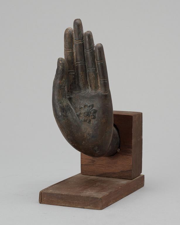 A  Thai bronze Buddha hand.