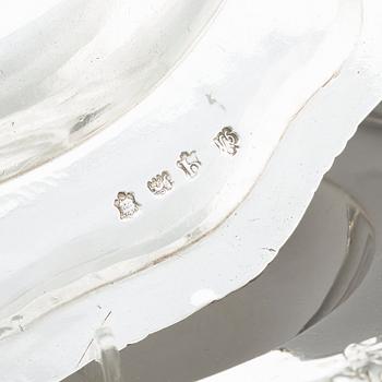 An English set of 4 x 2 silver plates, mark of Burwash & Sibley, E. Farrell, J.C. Edington London 1806-1837. (8).