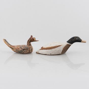 A set of six wooden duck decoys, 20th century.