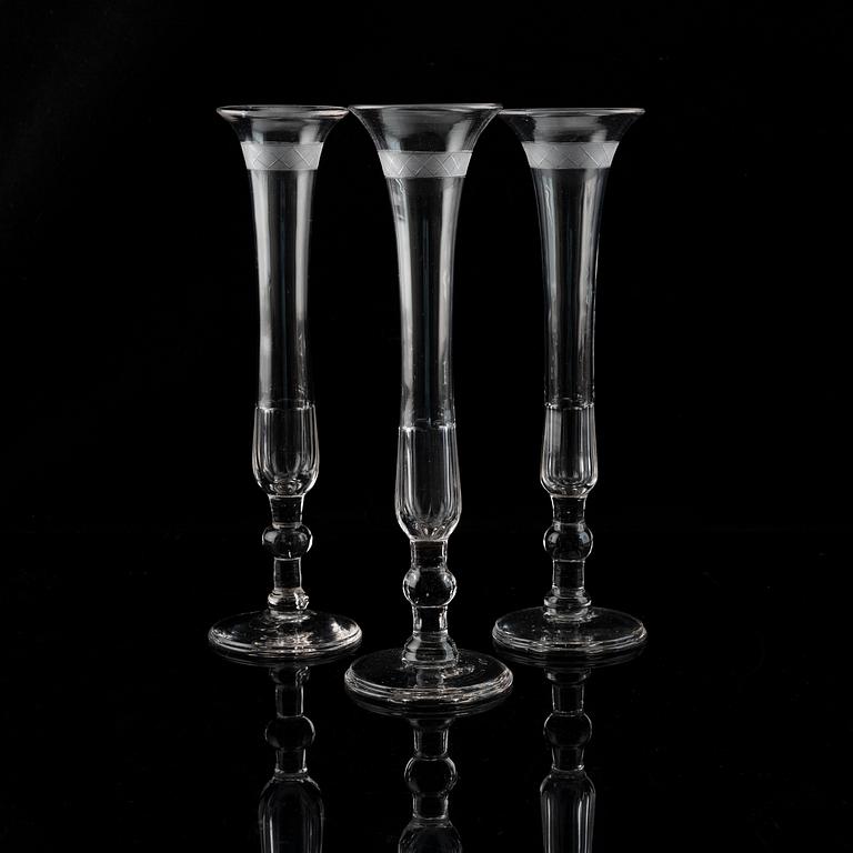 A set of nine early 19th century champagne flutes.