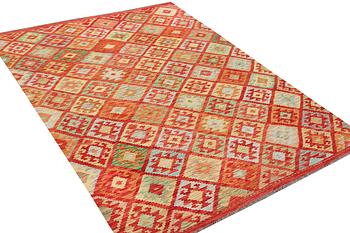 A Kilim carpet, c. 307 x 202 cm.