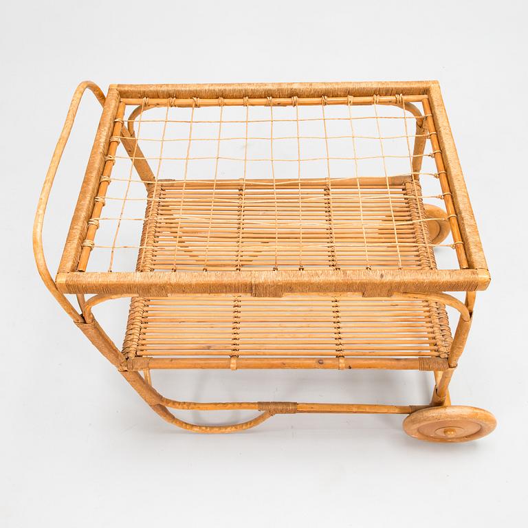 A mid-20th century tea trolley retailer  Artek.