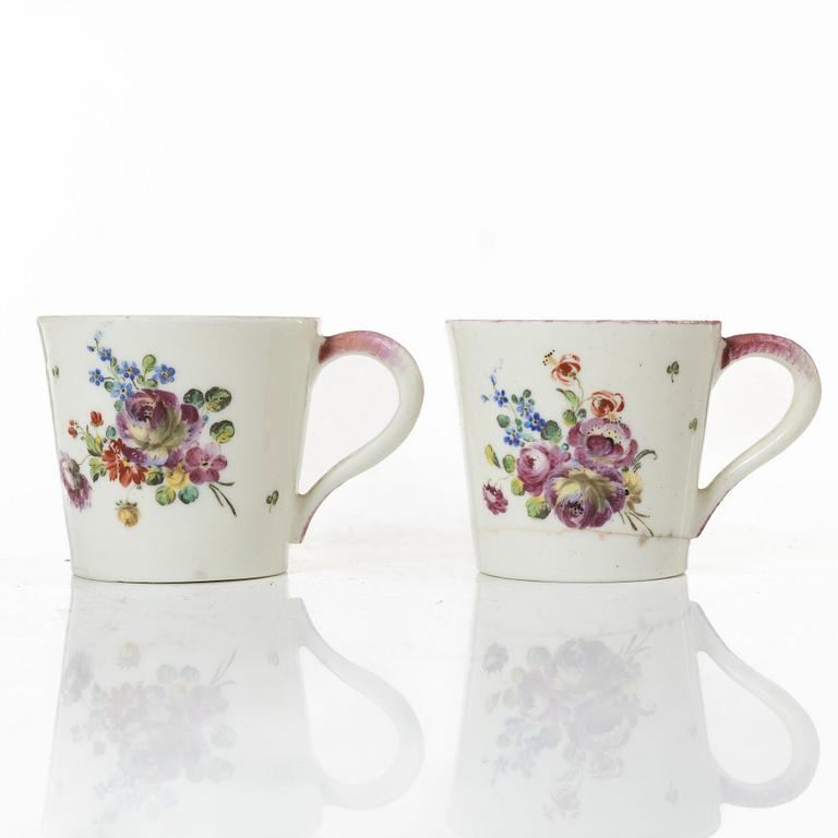 A pair of cups and saucers, France, 18th Century.